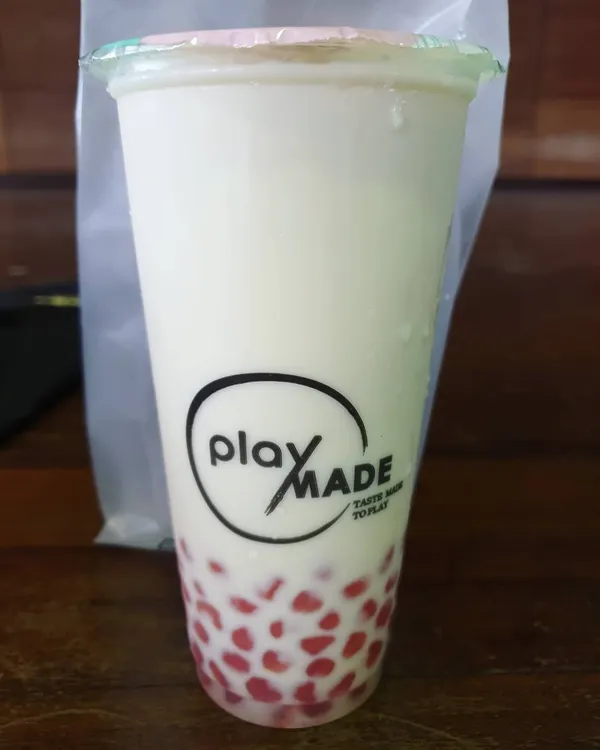 Chrysanthemum milk tea with pink cactus pearls ($5.40)!