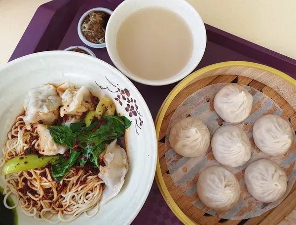 Pork dumpling noodles ($4) & Xiao long bao ($4.50)!
