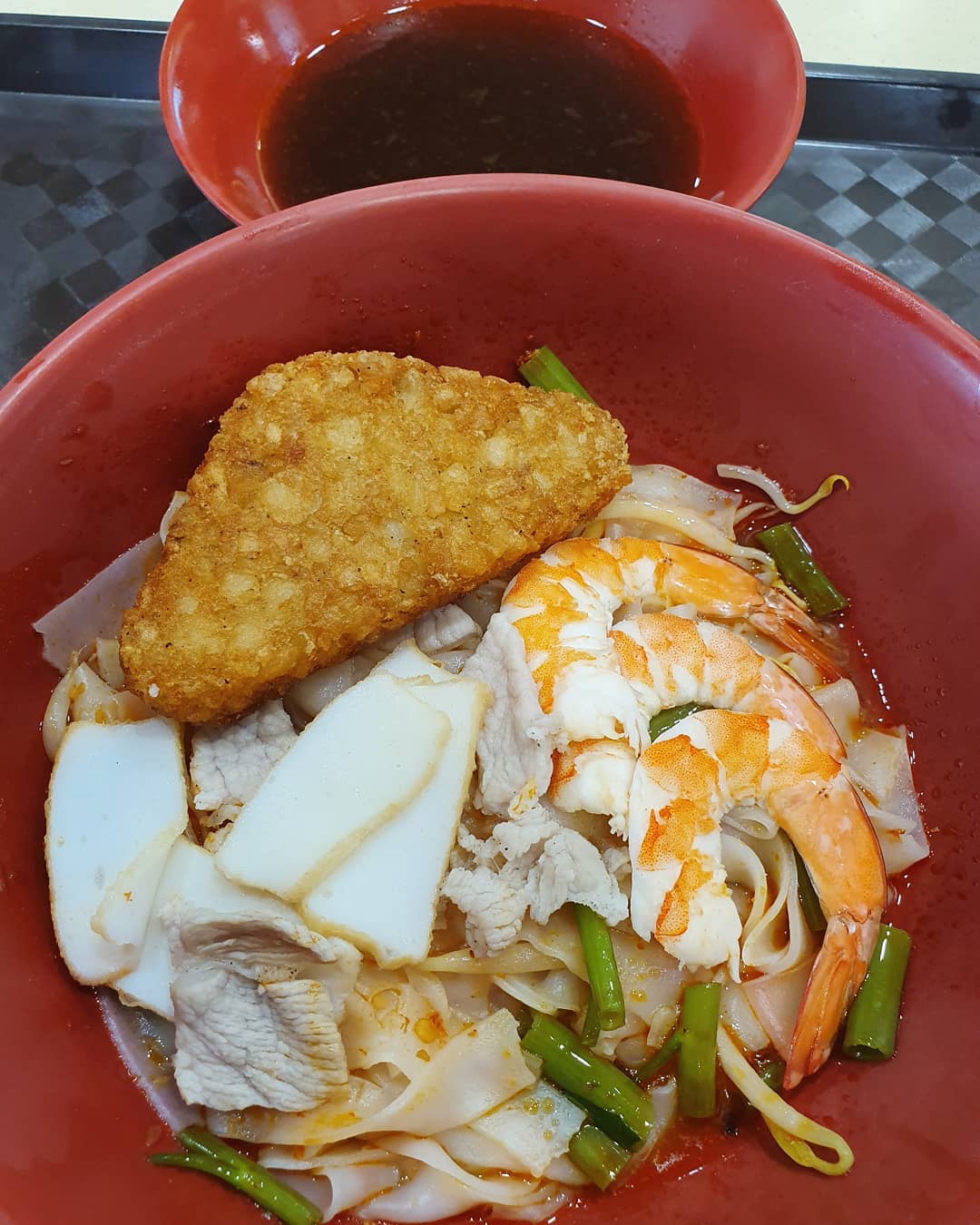 Prawn noodles, coincidentally with complimentary hash brown ($3.50)!