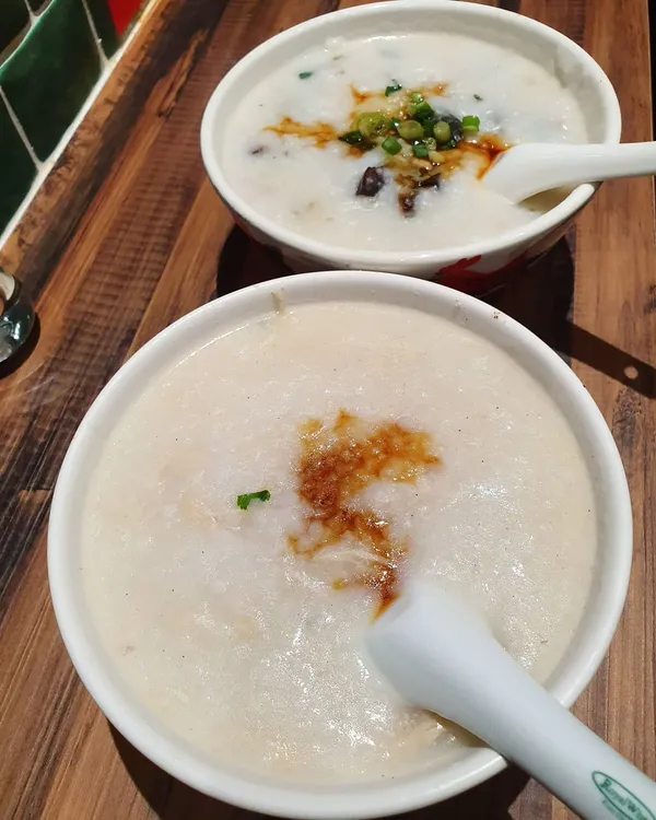 Sliced chicken porridge ($4.80) & Century egg with minced pork ($5.80)!