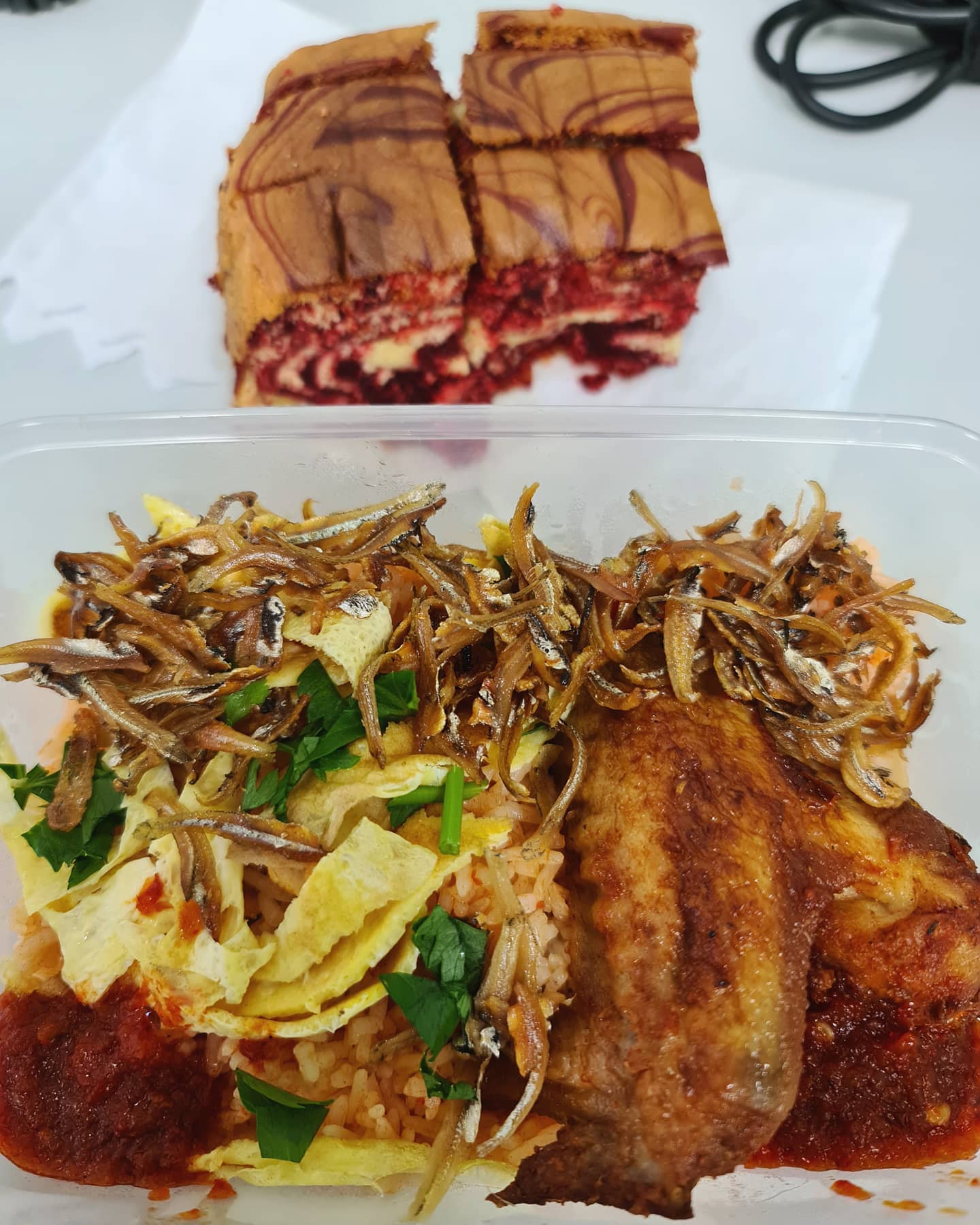 Home-cooked nasi goreng with ikan bilis & chicken wing ($3.50) + complimentary home-made cake!