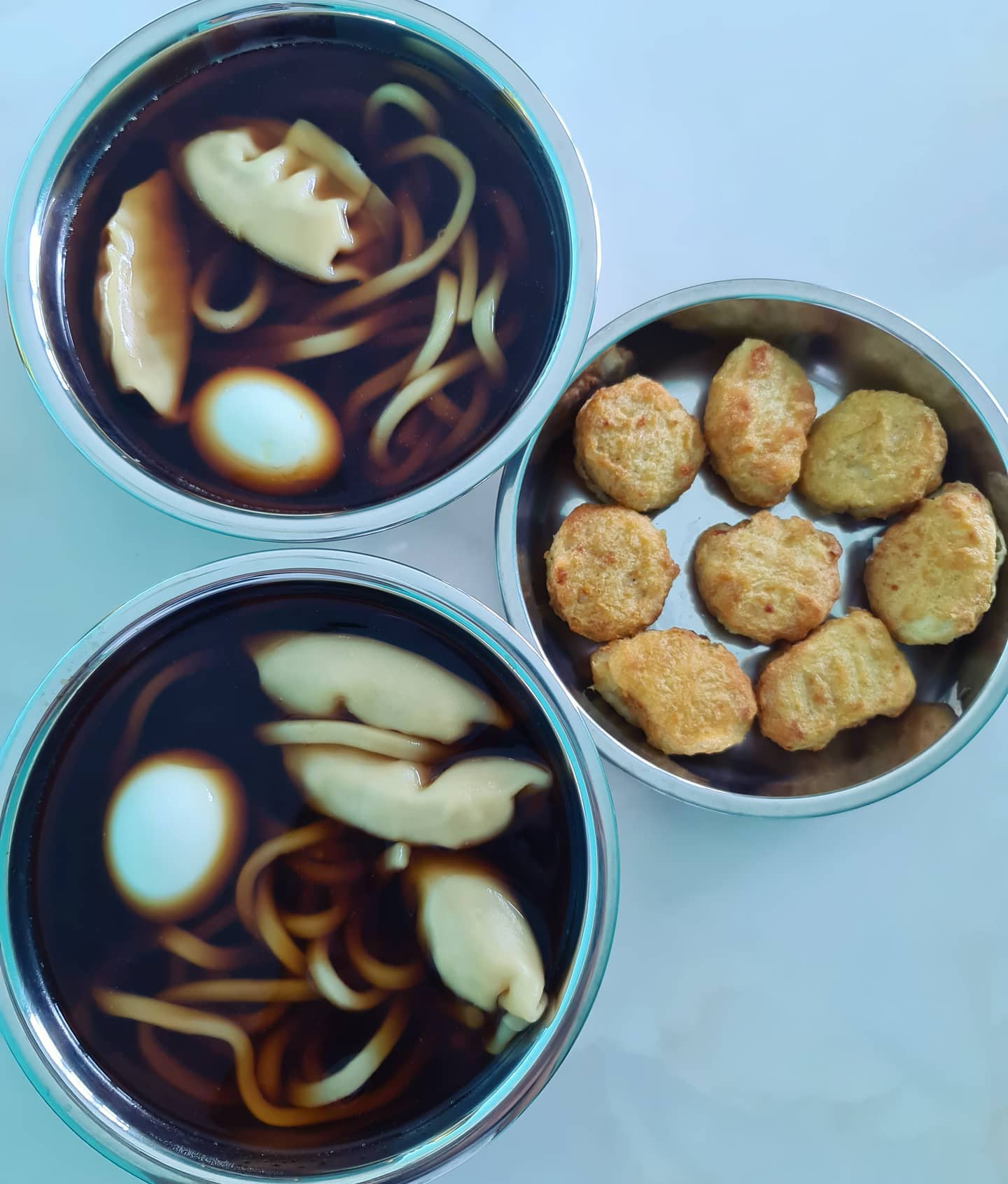 Cooked udon with salmon gyoza, Freezepak nuggets & egg for Saturday's brunch!