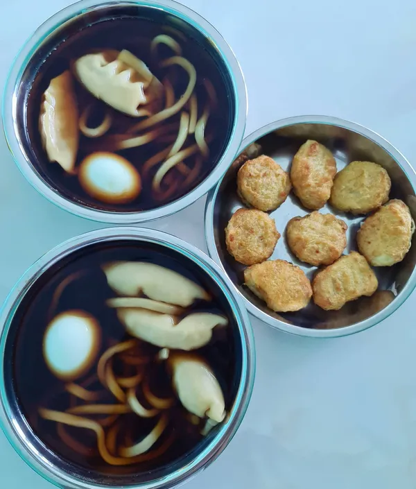 Cooked udon with salmon gyoza, Freezepak nuggets & egg for Saturday's brunch!