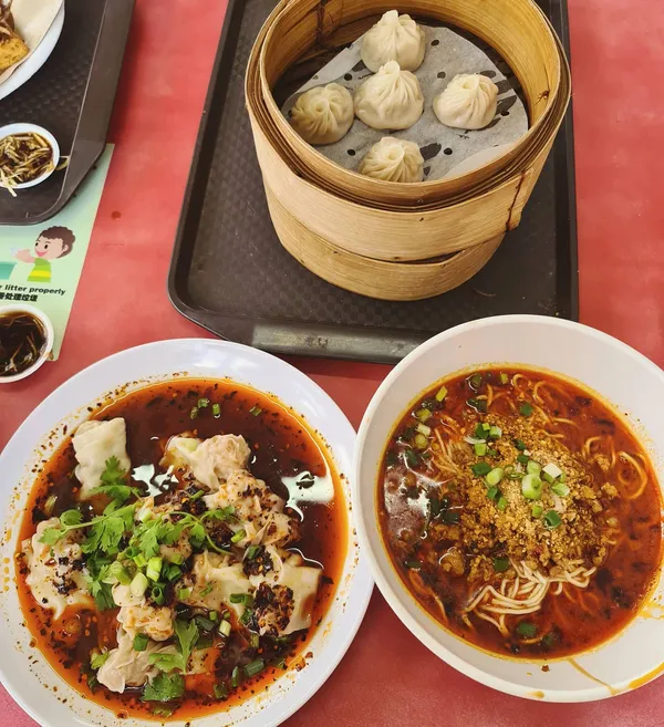 小笼包 ($6.50), 红油抄手 ($5), 四川担担面 x2 ($4.50 each)!