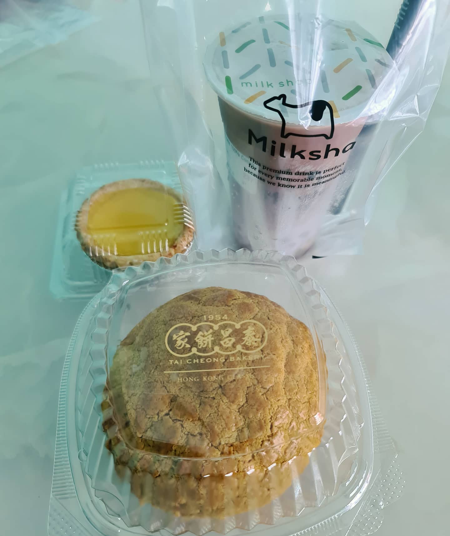 Valrhona 100% cocoa milk + honey pearl ($5.80) + egg tart + char siew polo bun!
