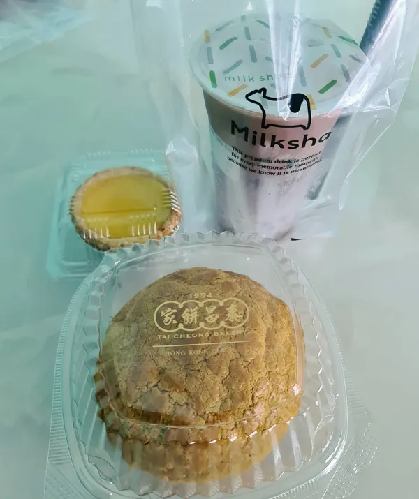 Valrhona 100% cocoa milk + honey pearl ($5.80) + egg tart + char siew polo bun!