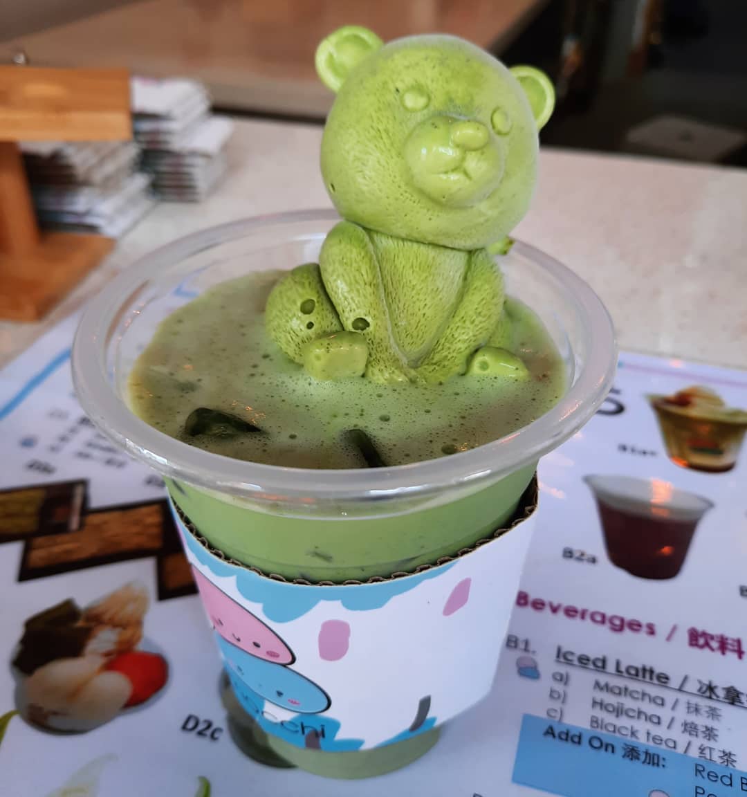 Matcha latte with matcha soft serve kuma (🐻🍵🍦 $6.60)!