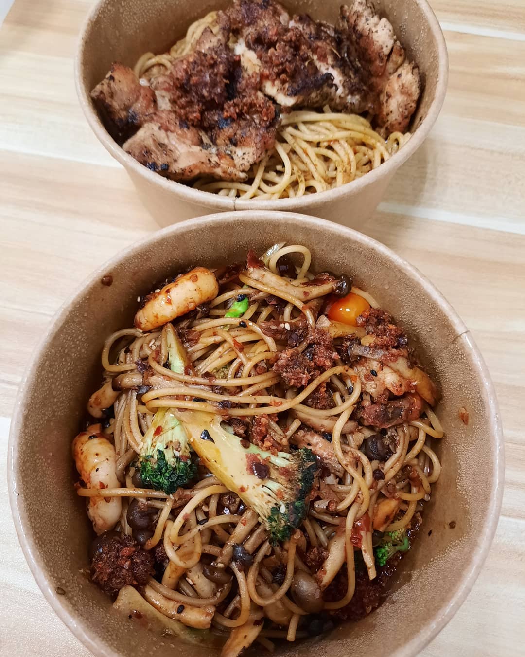 Mala shrimp spaghetti + Chicken chop laksa spaghetti ($7.50 + $8.50)!