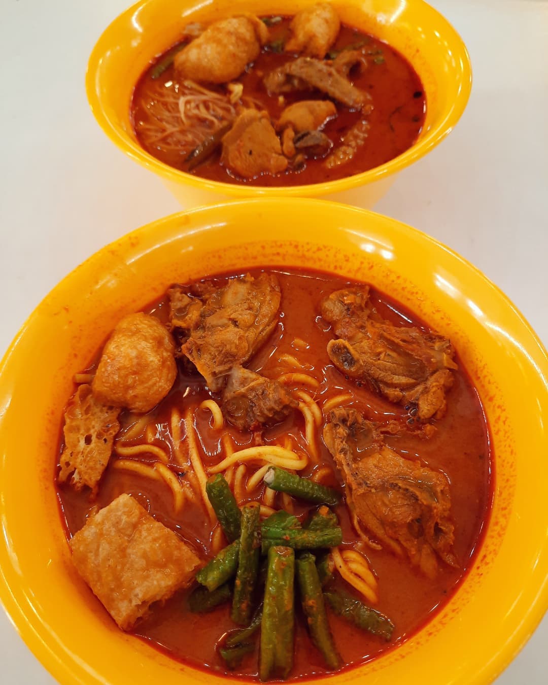 Curry chicken noodles with BB at a hawker stall ($5 each)!