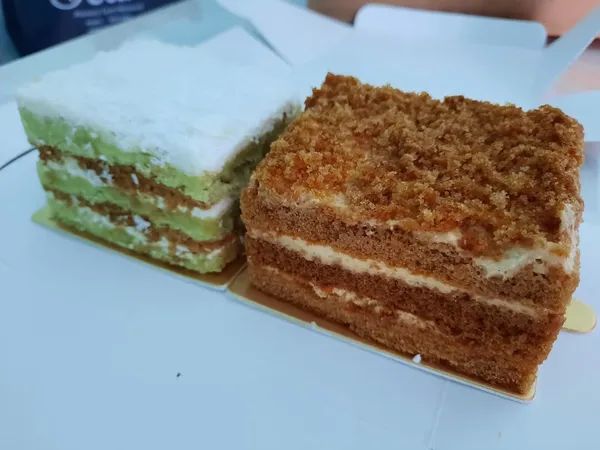 Honey Cake + Pandan Coconut Gula Melaka Cake ($8 each)!