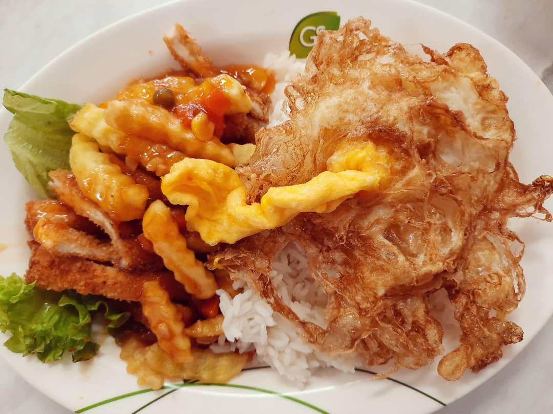 Hainanese pork chop rice + fried egg ($7.50)!