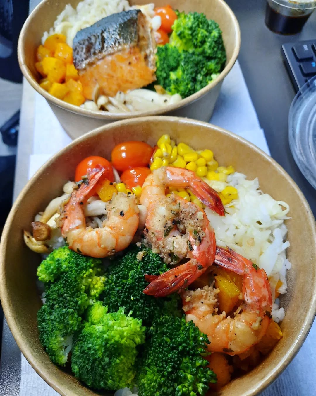 Black pepper salmon + garlic butter prawn rice bowls!