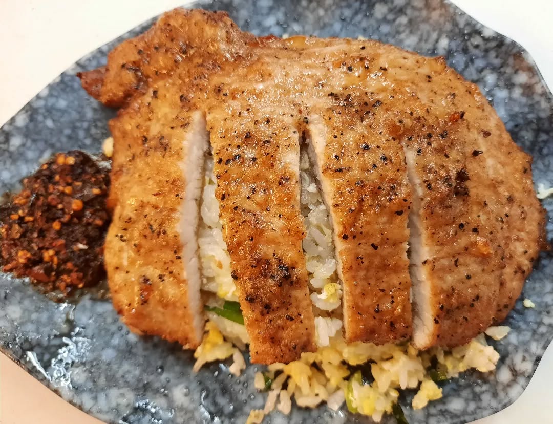 Truffle egg fried rice + pork cutlet ($8.50)!