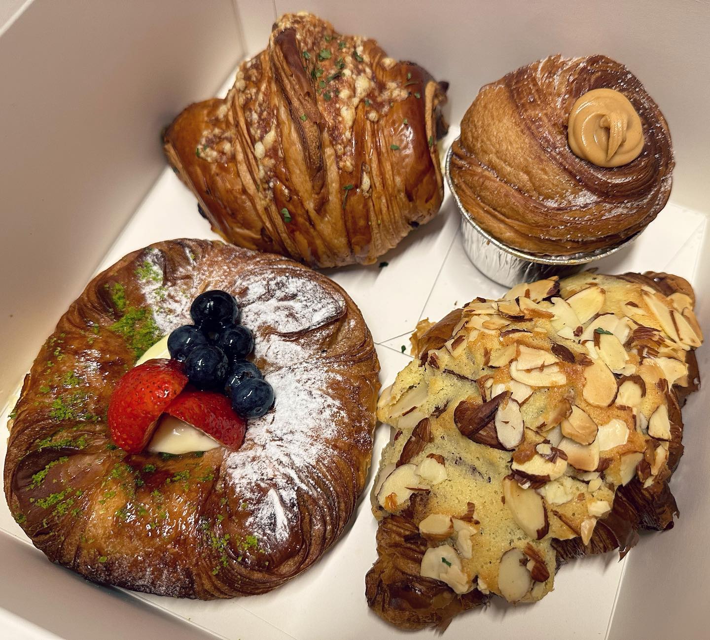 Croissants + danish + cruffin ($21.30)!