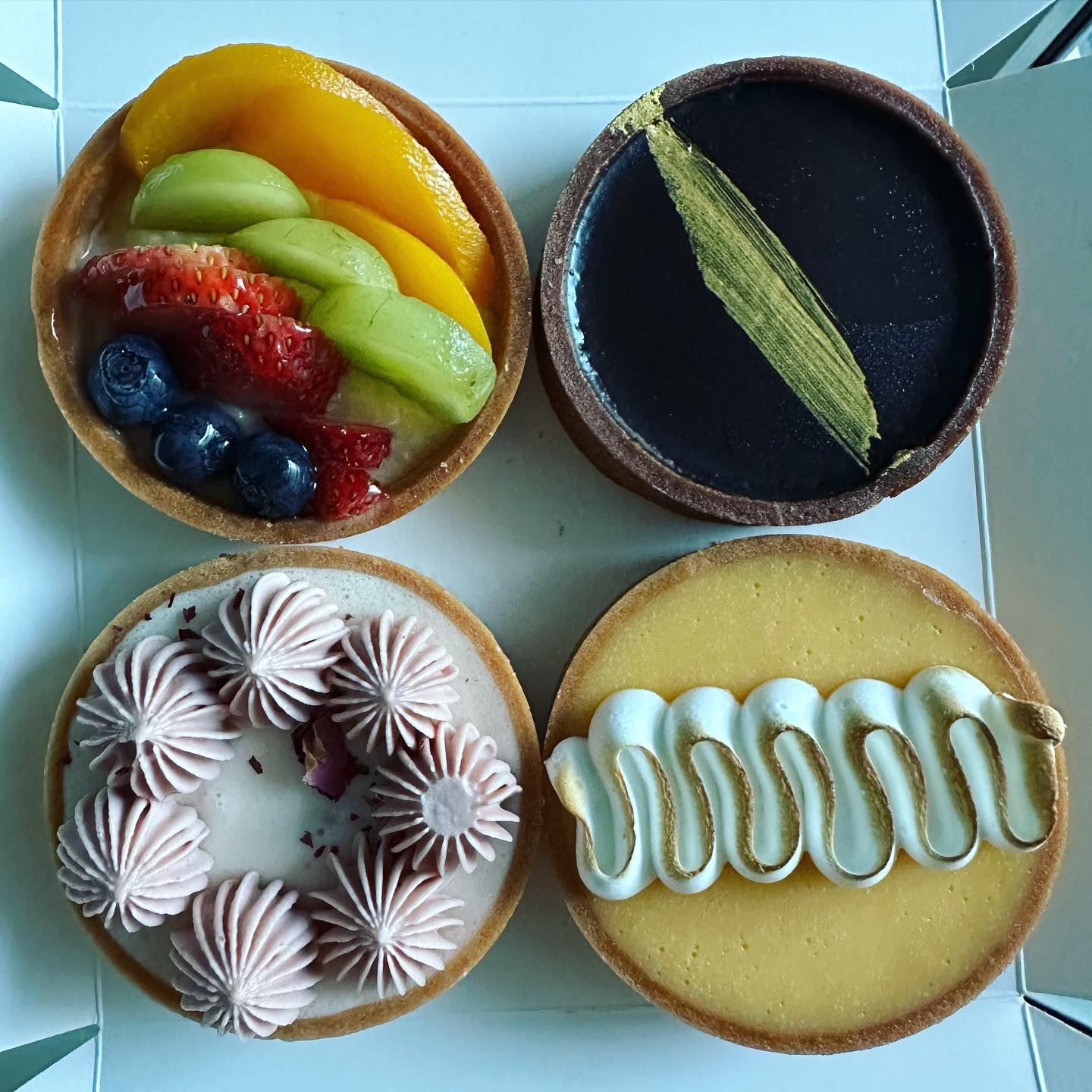 Tarts box — mixed fruits + dark chocolate + lychee + lemon meringue ($30)!