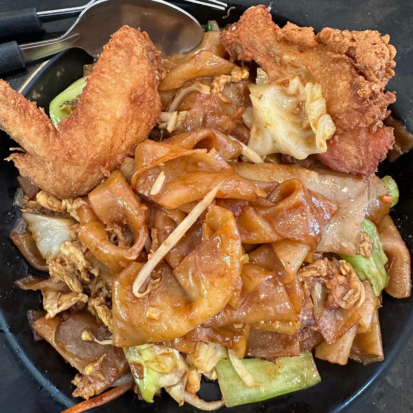 Thai pad see ew + fried chicken wing ($7.50)!