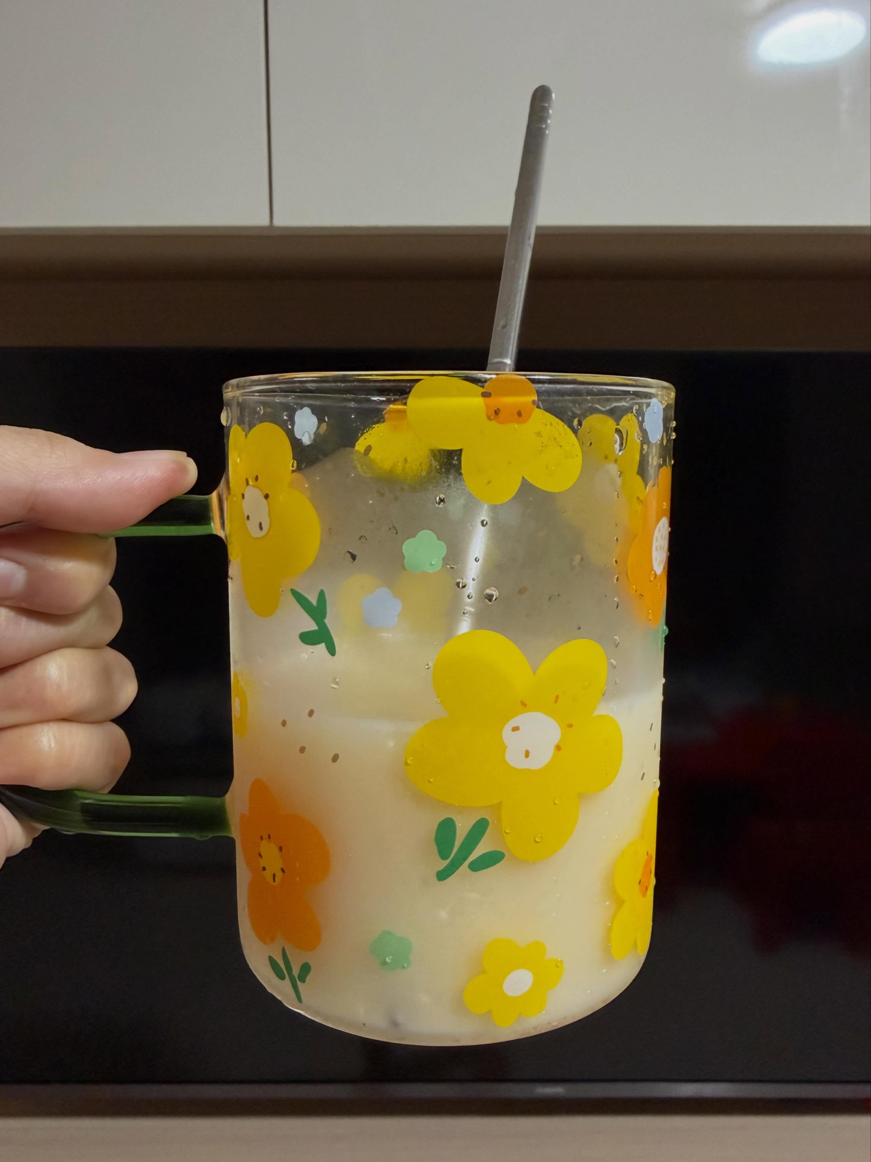 Soju Yakult Sprite cocktail in floral mug