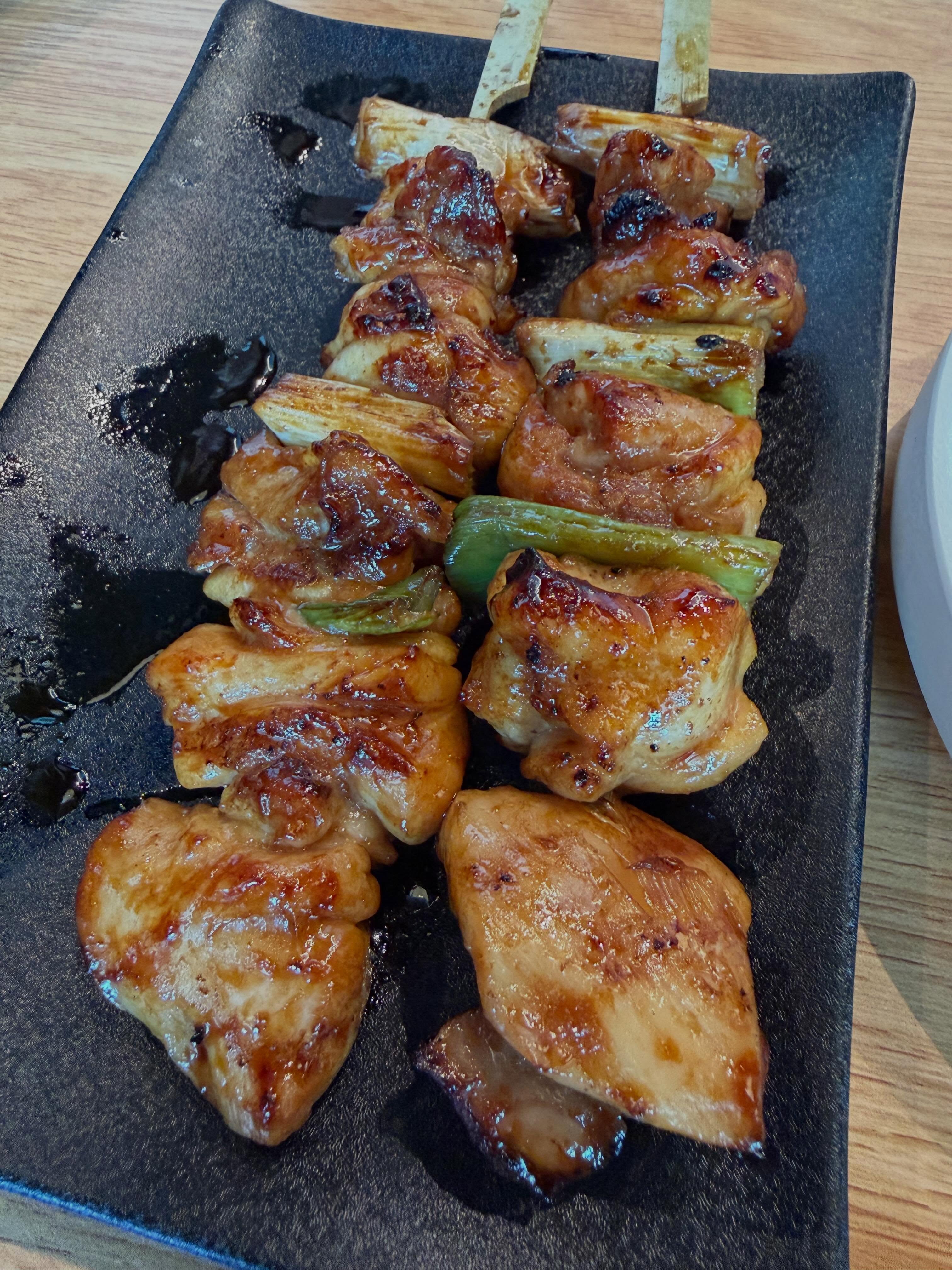 Glazed Kizokuyaki Thigh signature skewers, chicken thigh with green onion at Torikizoku VivoCity