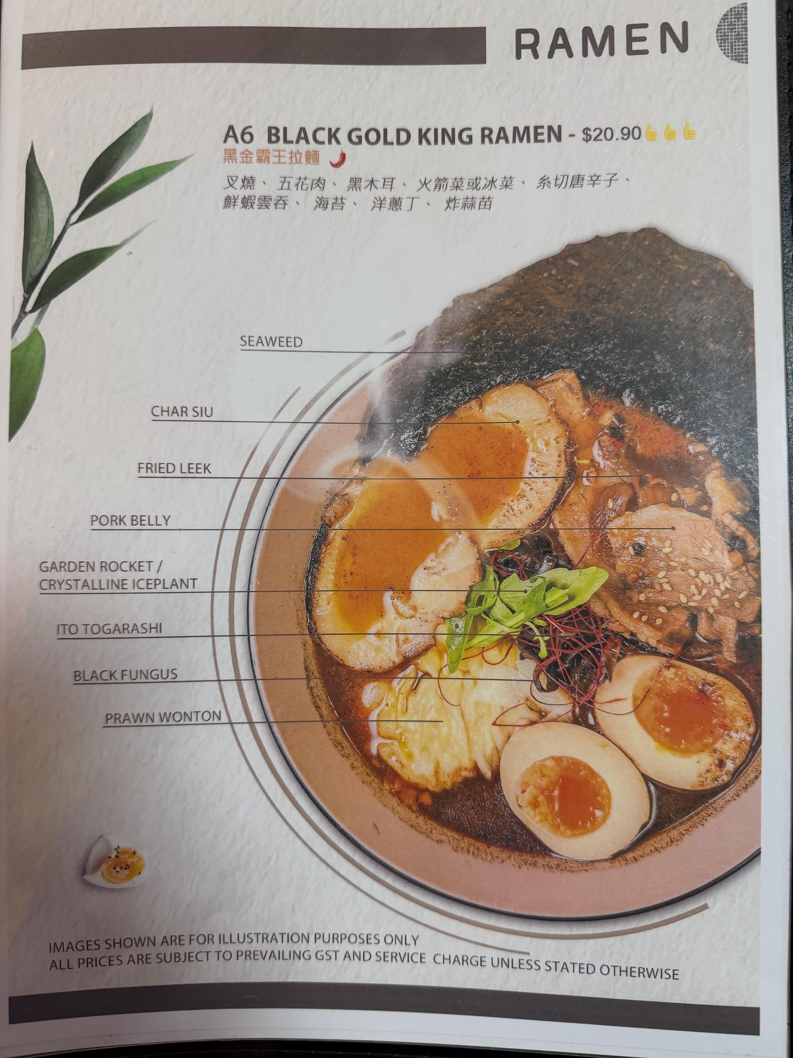 A6 Black Gold King Ramen menu showing chashu, pork belly, black fungus, fried leek, garden rocket, ito togarashi, prawn wonton, ajitama, seaweed